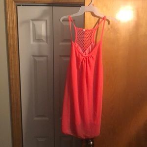 Bright orange dress. Perfect for beach or island